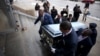 Pallbearers carry the casket of Quintonio LeGrier during his funeral in Chicago, Jan. 9, 2016. LeGrier was fatally shot by a Chicago police officer after allegedly swinging a baseball bat at him.
