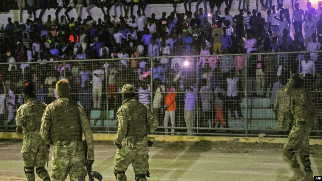 FILE - Somali security forces patrol during a soccer match at Konis Stadium, in Modadishu, Somalia, Sept. 8, 2017.