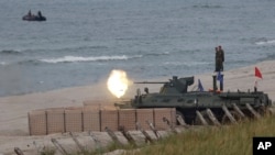 Військовослужбовці російської армії беруть участь у Міжнародних армійських іграх 2022 року в російському балтійському ексклаві Калінінград, Росія, 24 серпня 2022 року. Фото AP