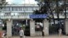 FILE - Pedestrians walk past the Federal High Court building in Addis Ababa, Ethiopia, Nov. 1, 2011. Laws in Ethiopia designed to prosecute terrorism are increasingly being used to silence political dissidents, opposition party members, journalists and others in civil society, according to Amnesty International.