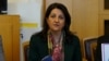 FILE - Pervin Buldan of the People's Democratic Party addresses reporters before starting a hunger strike in support of jailed Kurdish lawmaker Leyla Guven's own hunger strike against the isolation of Kurdish rebel leader Abdullah Ocalan in prison, in Ankara, Dec. 4, 2018.