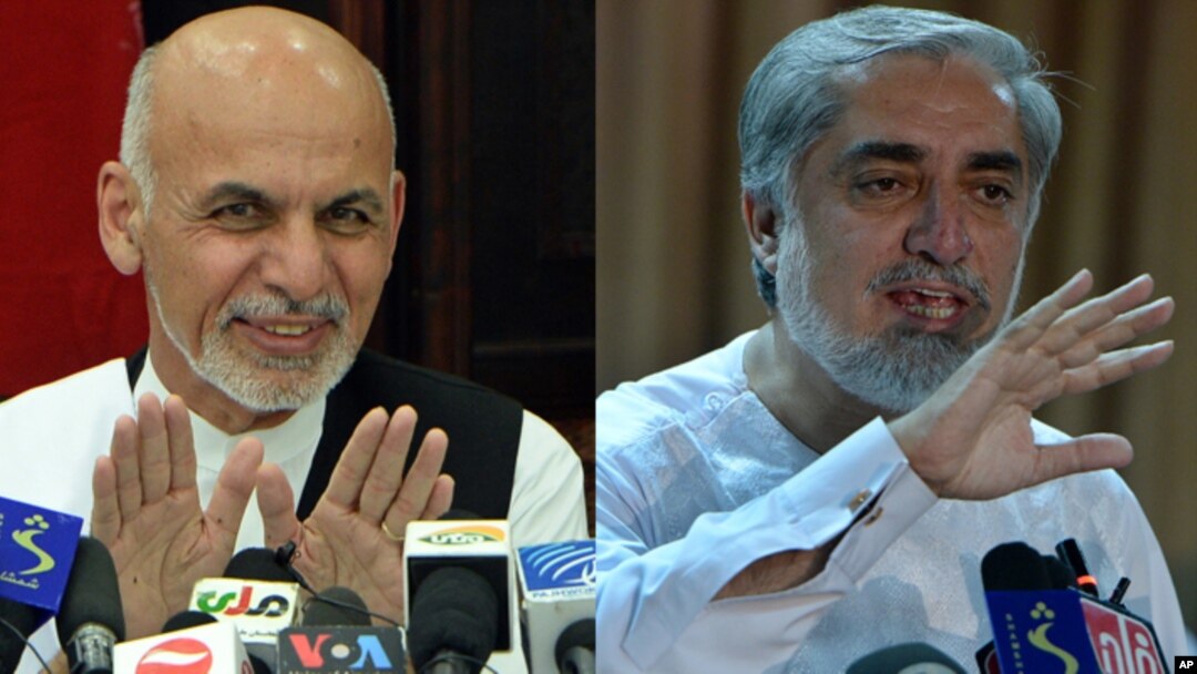 FILE - Afghan presidential candidate Ashraf Ghani, left, and rival presidential candidate Abdullah Abdullah.