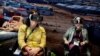 FILE - Participants watch virtual reality movie "Born into Exile," about two pregnant women who are due to deliver in Za'atari refugee camp, Jordan, during Women Deliver, a major women's health and rights conference in Copenhagen, Denmark, May 17, 2016.