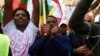 FILE - Ethiopian migrants, all members of the Oromo community of Ethiopia living in Malta, protest in Valletta against the Ethiopian regime's plan to evict Oromo farmers to expand Ethiopia's capital, Addis Ababa, Dec. 21, 2015.