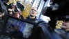 Russian opposition leader Sergei Udaltsov speaks to media after visiting the Russian Investigative Committee's office in Moscow, October 26, 2012.