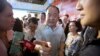FILE - Literature Nobel Prize winner Mo Yan attends a book fair in Beijing on Aug. 23, 2017. Mo, one of China's most celebrated authors, has been sued and accused of violating the Heroes and Martyrs Protection Law.