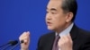 Chinese Foreign Minister Wang Yi attends a news conference on the sidelines of the National People's Congress, China's parliamentary body, in Beijing, March 8, 2019.