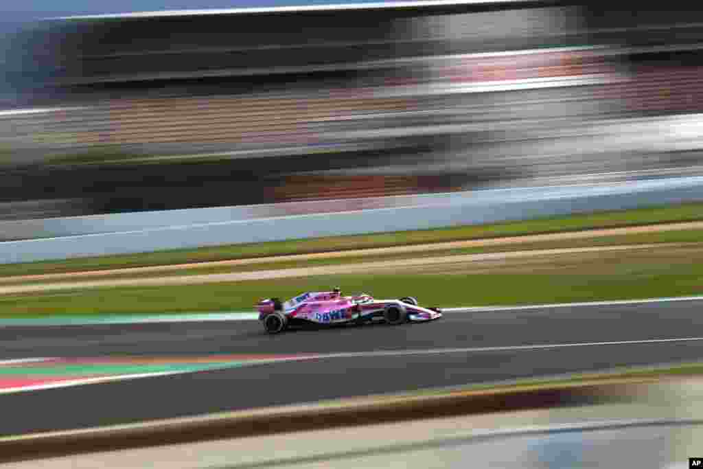 Force India drivers Sergio Perez of Mexico steers his car during a Formula One pre-season testing session in Montmelo, outside Barcelona, Spain.