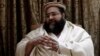 FILE - Muhammad Tahir Ashrafi, head of the powerful Ulema Council of clerics, speaks during an interview with Reuters in Islamabad.