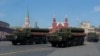 FILE - Russian servicemen drive S-400 missile air defense systems during the Victory Day parade in Moscow, May 9, 2018.
