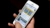 FILE - An Iranian man shows Telegram app messages on his mobile phone in Tehran, Feb. 24, 2016. 