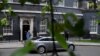 FILE - Britain's Prime Minister Theresa May leaves 10 Downing Street, as she faces a vote on alternative Brexit options, in London, March 27, 2019. 