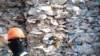 FILE - A container is filled with plastic waste from Australia, in Port Klang, Malaysia, May 28, 2019.