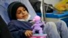 FILE - A child suffering from blood cancer (Leukemia) receives treatment at an oncology ward of a hospital in the Yemeni capital Sanaa, on World Cancer Day, on Feb. 4, 2021.