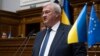 In this photo provided by the Ukrainian Parliament Press Office, Ukraine's newly appointed Foreign Minister Andrii Sybiha speaks in parliament in Kyiv, Ukraine, Sept. 5, 2024.