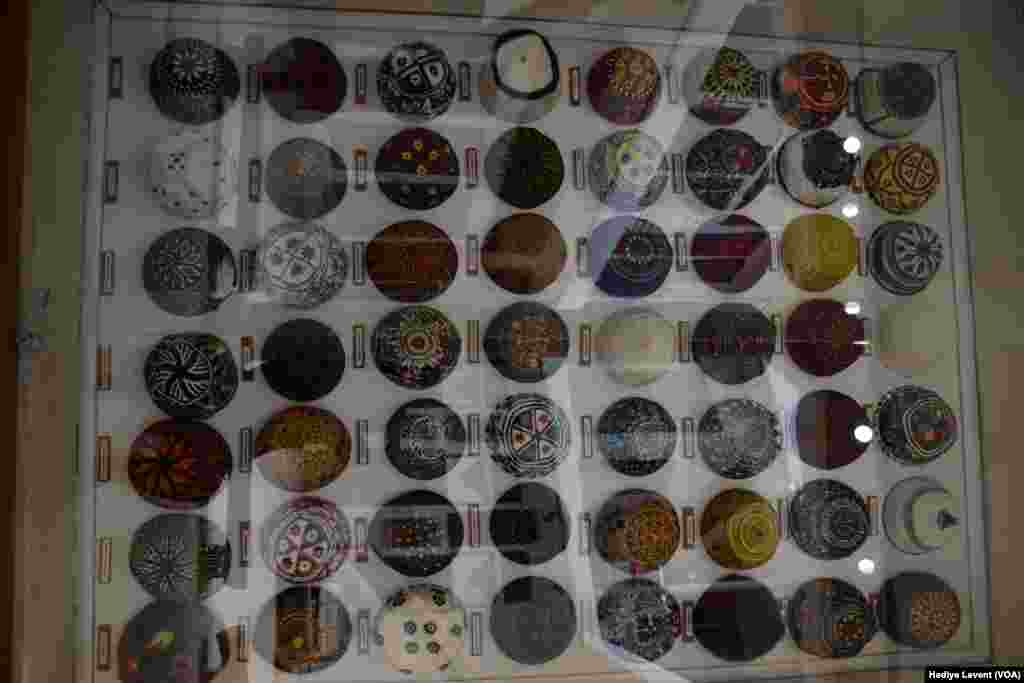 A display of caps in a museum, in Irbil, Iraq.