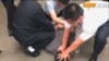 香港驻京记者2018年5月16日采访被公安强行带走 （网络照片）