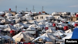 FILE - A view of the al-Hol displacement camp in Hasaka governorate, northeastern Syria, April 1, 2019.