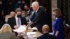 U.S. Vice President Mike Pence and Speaker of the House Nancy Pelosi take part in a joint session of Congress to certify the 2020 election results on Capitol Hill in Washington, Jan. 6, 2021. 