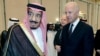 FILE - In this Oct. 27, 2011, photo, then-U.S. Vice President Joe Biden offers his condolences to then-Prince Salman bin Abdel-Aziz upon the death of his brother, Saudi Crown Prince Sultan bin Abdul-Aziz Al Saud, in Riyadh.