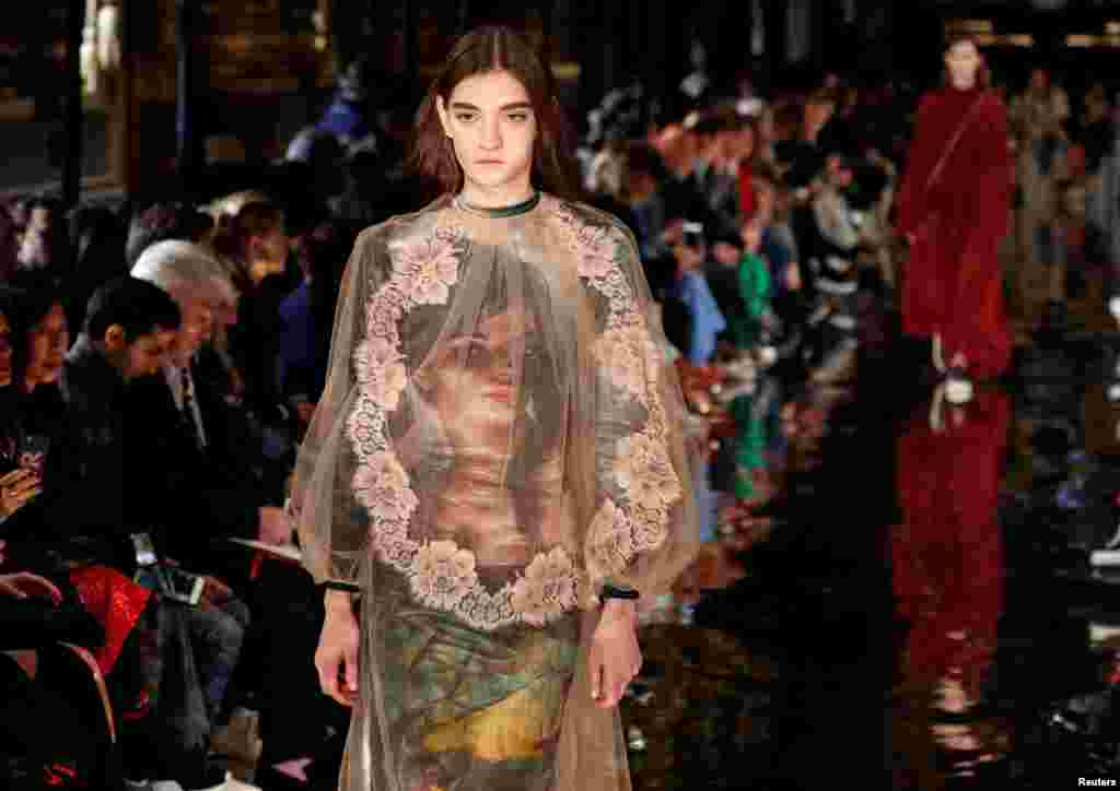 A model presents a creation by British designer Stella McCartney, during her Autumn/Winter 2018-2019 women's ready-to-wear collection show, at Fashion Week in Paris, France.
