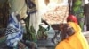 Flood victims from the northern Cameroon village of Kaikai. Heavy rains and floods this week have left at least 100,000 people homeless on both sides of the border between northern Cameroon and Chad. (M. Edwin Kindzeka/VOA)