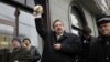 Member of Just Russia political party Gennady Gudkov, center, near Bolotnaya square, Moscow, Dec. 10, 2011.